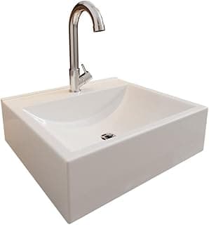 Pia de banheiro branca com torneira de aço inoxidável, fundo branco