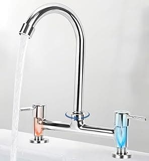 Torneira de cozinha com controle de temperatura e bico duplo, cromada com detalhes em azul e cobre.